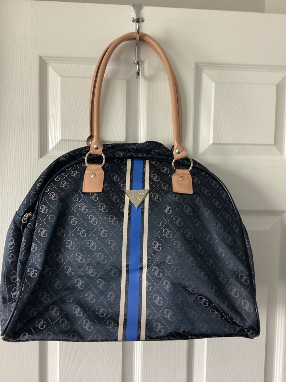 Guess Navy Blue Monogram Travel Bag with Tan Handles and Blue Stripe